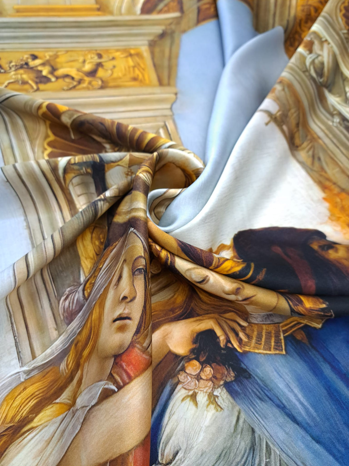 Italian printed mulberry silk satin showcasing Botticelli artwork with a smooth luxurious finish.
