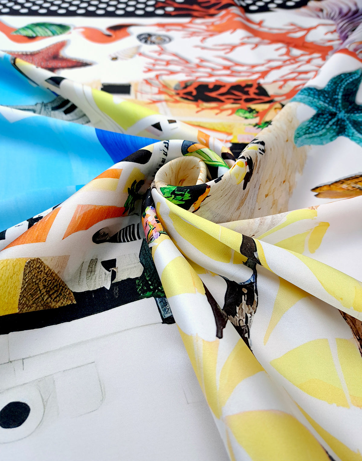 Lustrous Italian Mulberry silk satin displaying the Capri landscape, colorful architecture and Mediterranean marine motifs.