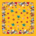 Italian printed silk satin panel featuring colorful starfish, seashells and pearl strands on a vibrant yellow background.