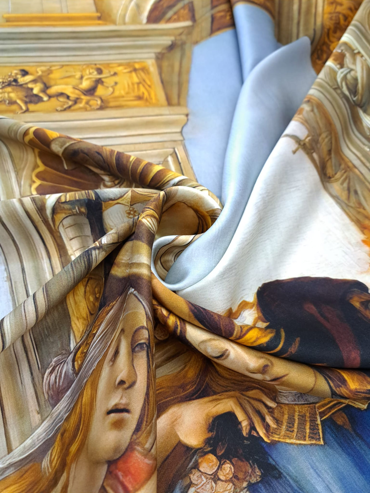 Printed silk fabric inspired by Botticelli's Renaissance masterpiece with rich architectural artwork.