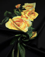 Italian silk satin with luminous yellow roses and green foliage against a rich black background