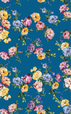Turquoise blue Mulberry silk satin covered with scattered painterly flowers in pink, yellow, violet and powder blue.