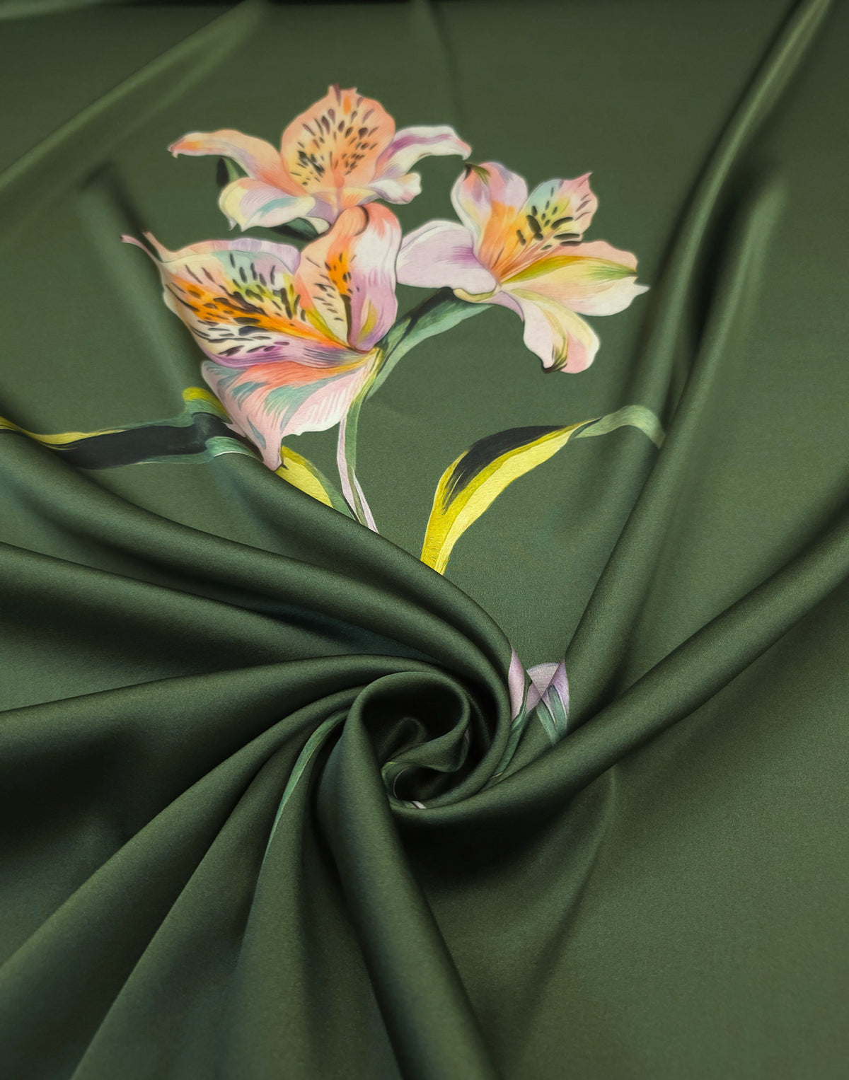 Lustrous Italian silk satin in deep olive green with pink Alstroemeria flowers and fluid folds