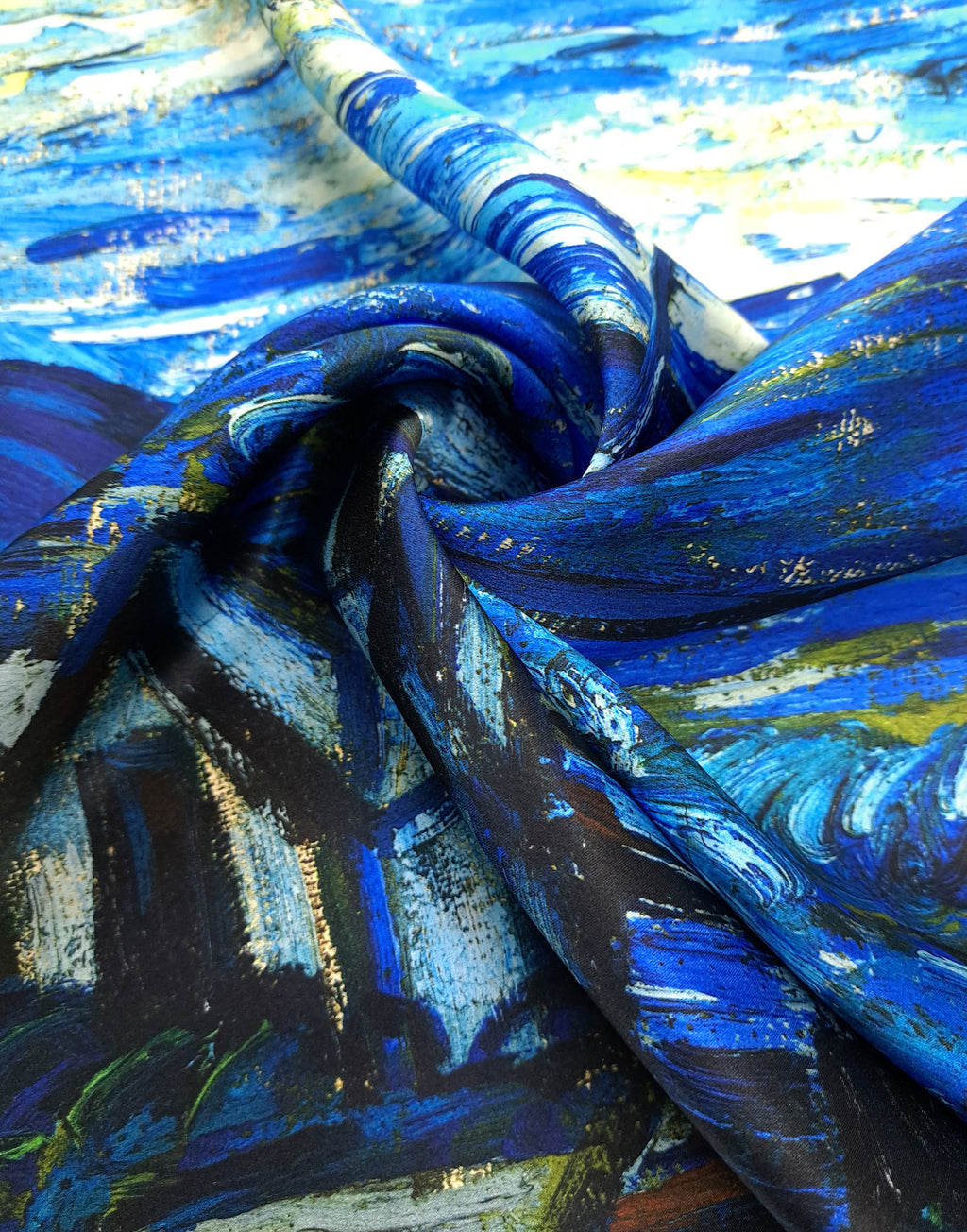 Natural silk satin printed with Vincent van Gogh’s The Starry Night, featuring a swirling blue sky and luminous golden stars
