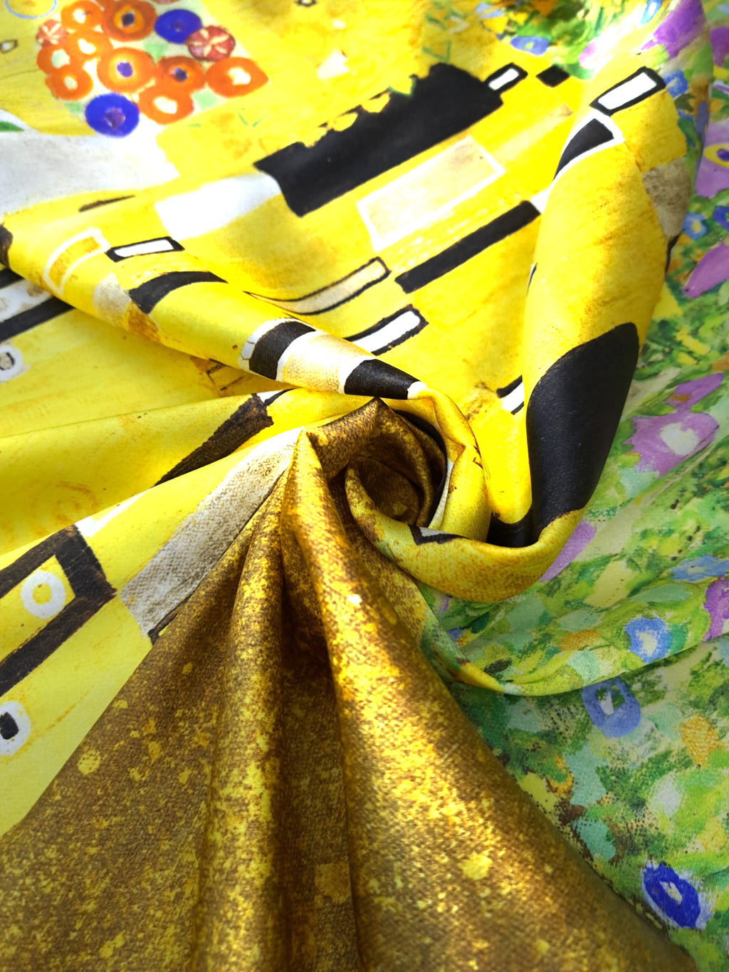 Printed 100% mulberry silk satin fabric featuring The Kiss by Gustav Klimt, made in Italy with a luxurious satin finish for couture fashion and premium accessories.