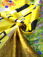 Printed 100% mulberry silk satin fabric featuring The Kiss by Gustav Klimt, made in Italy with a luxurious satin finish for couture fashion and premium accessories.