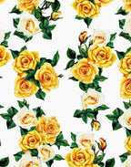 Yellow and ivory roses with dark green leaves printed on Italian silk satin.